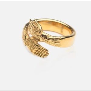 Gold tone hug ring brand new